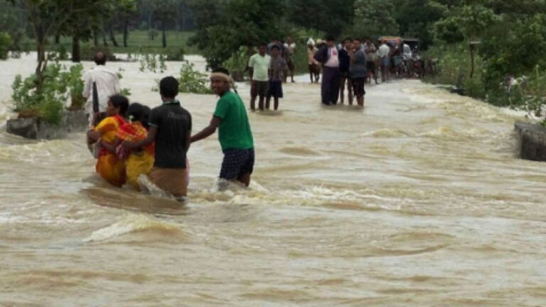 Flash flood victims try to survive