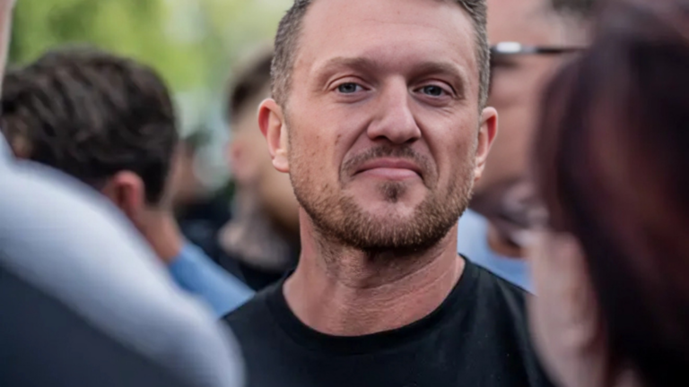Tommy Robinson Says He Was Detained at Heathrow as Police Seize His Phone Amid Fallout From NI Riots