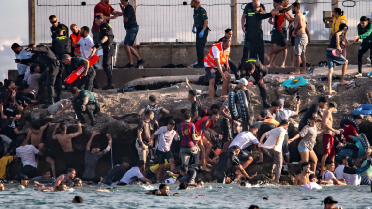 Ceuta Overwhelmed as 49,000 Migrants Cross from Morocco in 24 Hours, Spain Deploys Armed Forces