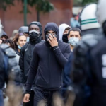 Hundreds Clash With Police During Brussels Protest Against Austerity Measures