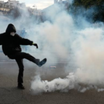 Tear Gas, Defiant Chants and Mass Demonstrations as Protests Sweep Across France